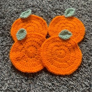 Handmade crochet coasters orange figure